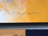 a painting on the table that has a picture on it
