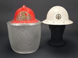 two hats that are next to each other on a mannequin head