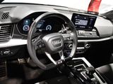 the interior of a car with a steering wheel, dashboard, and a touch screen