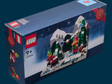 une boîte contenant un coffret Lego représentant un train de Noël
