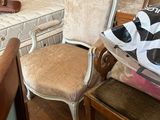 a bed and a chair in a room with a mattress