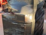 a large black box sitting on top of a pallet