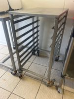 Un charriot bas en inox sur roulette, en l'état (sans grille… (photo 2)