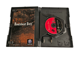 a cd in the case with a red disc