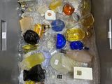 a metal container filled with lots of different types of items