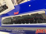 a toy train that is in a box on the table