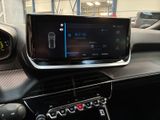the dashboard of a car with a digital display in the center