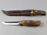 two knives that are sitting next to each other on a table