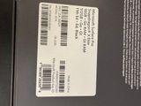 the back of a black box with a barcode on it
