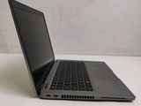 a laptop computer that is sitting on a table