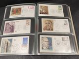 a lot of stamps in a folder on the table