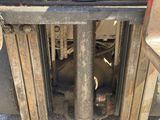 a close up of a fork lift truck with the front end of it