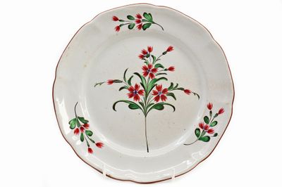 LES ISLETTES - Circa 1800 Assiette chantournée en faïence ém…