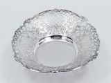 an image of a silver plate with a floral design on it