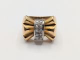 a close up of a gold ring with diamonds on a white background