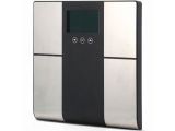 a black and silver electronic scale on a white background
