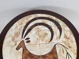 a picture of a ceramic plate with a horse on it