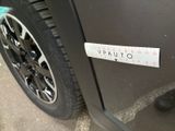 a sticker on the side of a car that says valuto