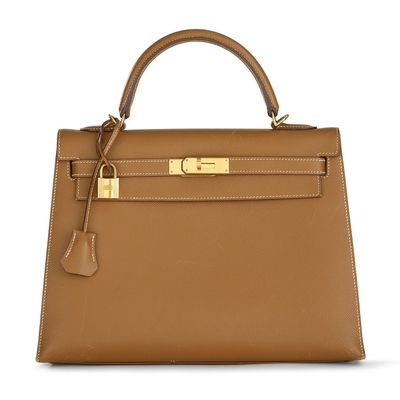 HERMÈS, Sac "Kelly" 32 cm sellier en veau Courchevel gold An…