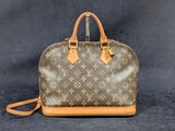 Sac Speedy Louis Vuitton en toile Monogram et cuir