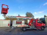 a red truck with a crane on the back of it