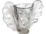 a clear glass vase with a leaf design on it