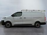 a white van that is parked in a parking lot