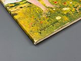a book with a picture of a woman in a field