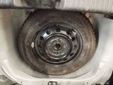 a close up view of a tire on a vehicle