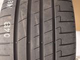 a close up of a tire on a box with a box in the background