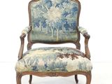 an image of a chair with a blue and white upholstered upholstered upholstered