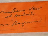 a close up of a piece of paper with writing on it