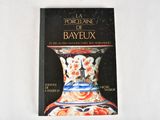 a book with a picture of a vase on it
