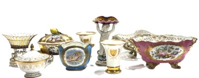 many different vases that are sitting on a white surface