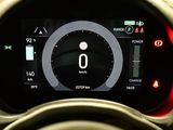 the dashboard of a car with a digital display showing the speed of the car