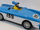 a blue and white toy car with a man in it