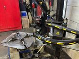 an image of a machine that is in a garage