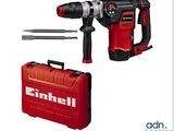 une perceuse et un outil dans un coffret rouge