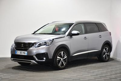 the new peugeot suv is parked in a white room