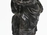 an image of a statue of a woman holding a child