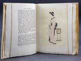 an open book with a drawing of a woman standing in front of a chair