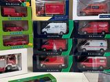 boxes of assorted toy vehicles are stacked on top of each other