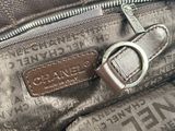 the inside of a purse with a zipper on it