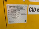 the label on the back of a yellow machine shows the date of the machine ' s operation