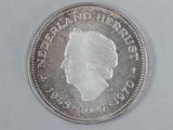 a close up of a coin on a white surface
