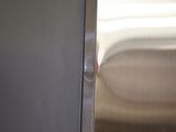 a close up of a door with a metal handle