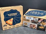 a box of food that is sitting next to a box of cookies
