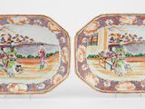 deux assiettes avec une peinture représentant un homme et une femme