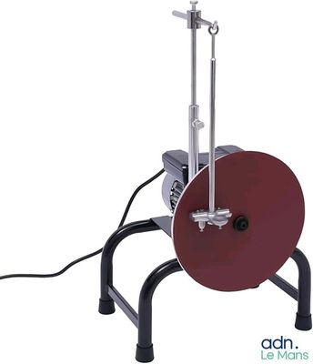 a machine that is sitting on a stand on a white background