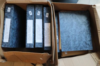 a box with a bunch of books inside of it